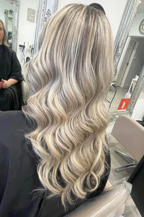 Classic curls on blonde highlighted hair